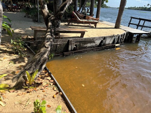 Riverfront with pier and pool