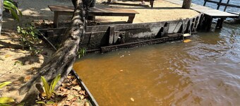 Riverfront with pier and pool
