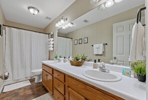 Shower, jetted tub, towels, soap