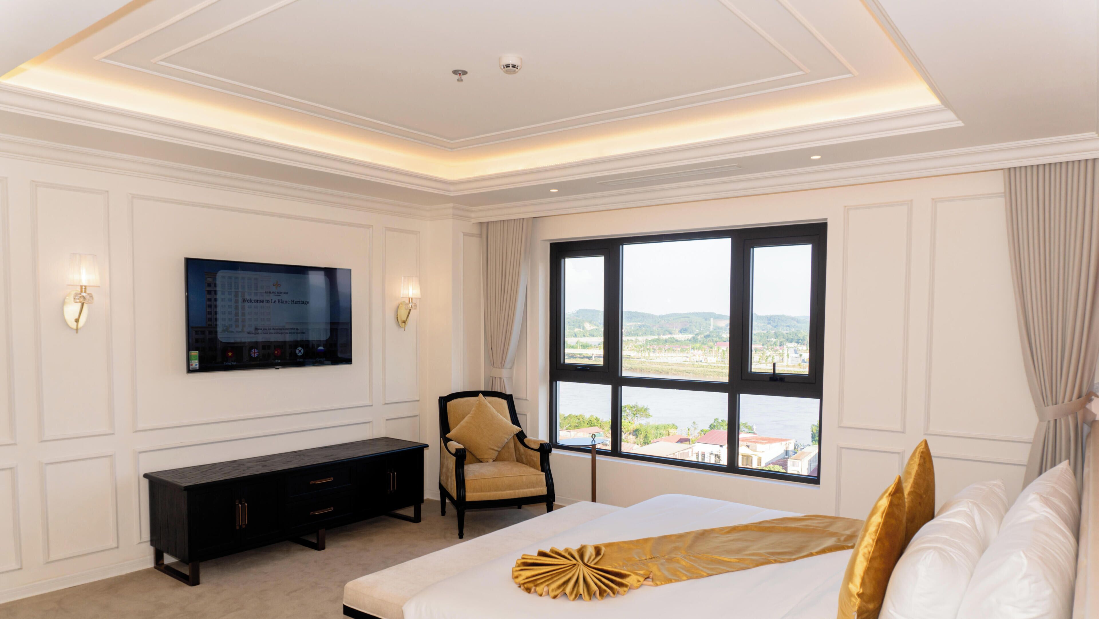 Kamar Double Junior | Seprai premium, bantalan ekstra lembut, minibar, dan brankas