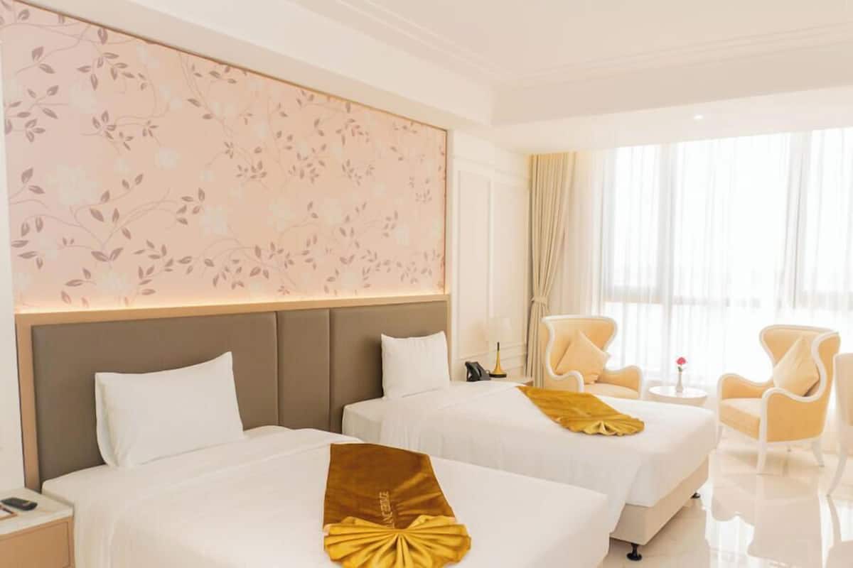 Habitación ejecutiva con 2 camas individuales | Ropa de cama de alta calidad, camas con pillow-top y minibar