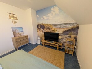 2 dormitorios, tabla de planchar con plancha, wifi gratis y ropa de cama