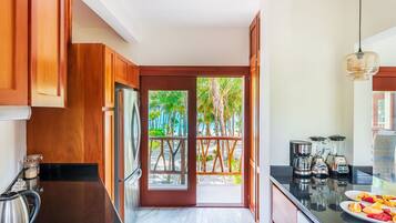 Luxury Villa | Private kitchen | Full-sized fridge, microwave, oven, stovetop