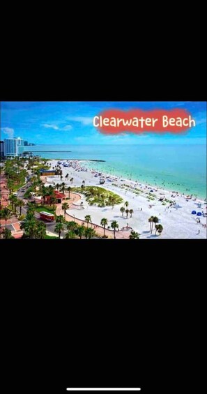 A beach scene with the text "Clearwater Beach" prominently displayed.