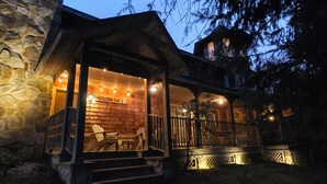 A stone building with a wooden deck and a sign reading "GOLDEN EAGLE". - The Golden Eagle Vacation Rental, a 3 minute walk to Timberline Ski Slopes (Davis)