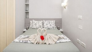 1 habitación, tabla de planchar con plancha, wifi gratis y ropa de cama 