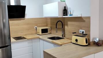 Microondas, parrilla de estufa y lavavajillas