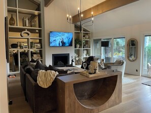 Smart TV, fireplace, books