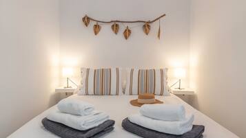 2 habitaciones, tabla de planchar con plancha, wifi y ropa de cama