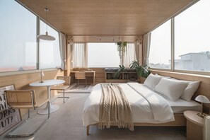 Premium bedding, memory-foam beds, free minibar items, in-room safe