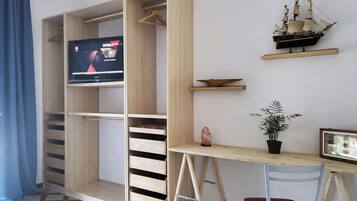 3 bedrooms, desk, iron/ironing board, travel cot