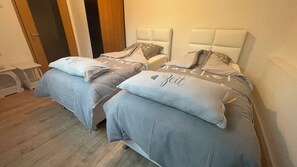 2 habitaciones, wifi gratis y ropa de cama