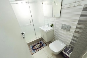 Hair dryer, towels, soap, toilet paper