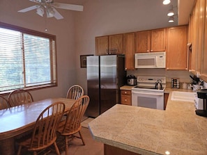 Coffee/tea maker, fridge, microwave, oven