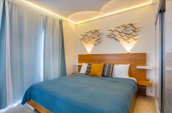 1 chambre, coffres-forts dans les chambres, fer et planche à repasser