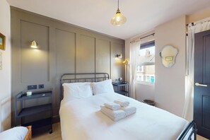 2 habitaciones, tabla de planchar con plancha y acceso a internet