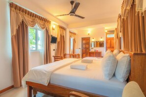 Family Room | Egyptian cotton sheets, premium bedding, in-room safe