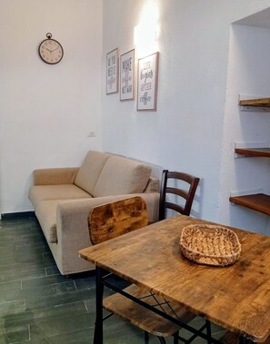 Departamento familiar, patio | Área de sala de estar