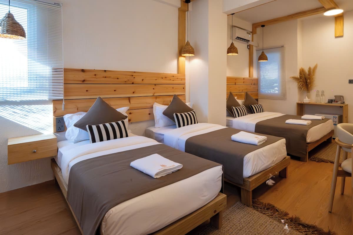 Family Room, 1 Bedroom | Minibar, in-room safe, desk, laptop workspace