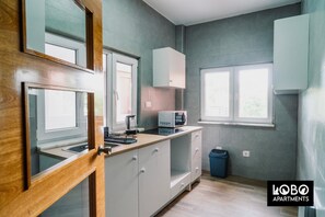 Fridge, microwave, cookware/dishes/utensils