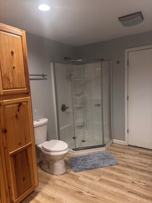 Shower, hair dryer, towels, soap