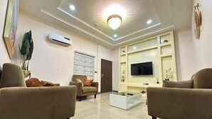 Economy Apartment, Balcony, City View | Living area - Starwave Homes (Abuja)