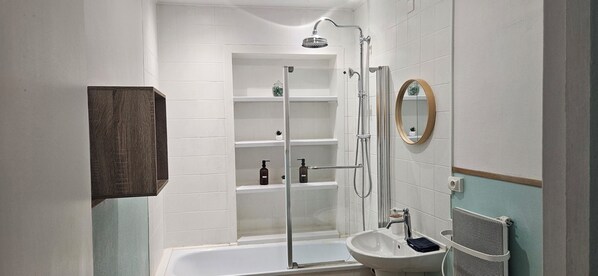 Hair dryer, towels, soap, shampoo
