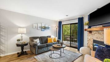 Condo, Multiple Beds, Balcony, Garden View (Blue Royale Retreat) | Living area | 42-inch flat-screen TV with digital channels, fireplace