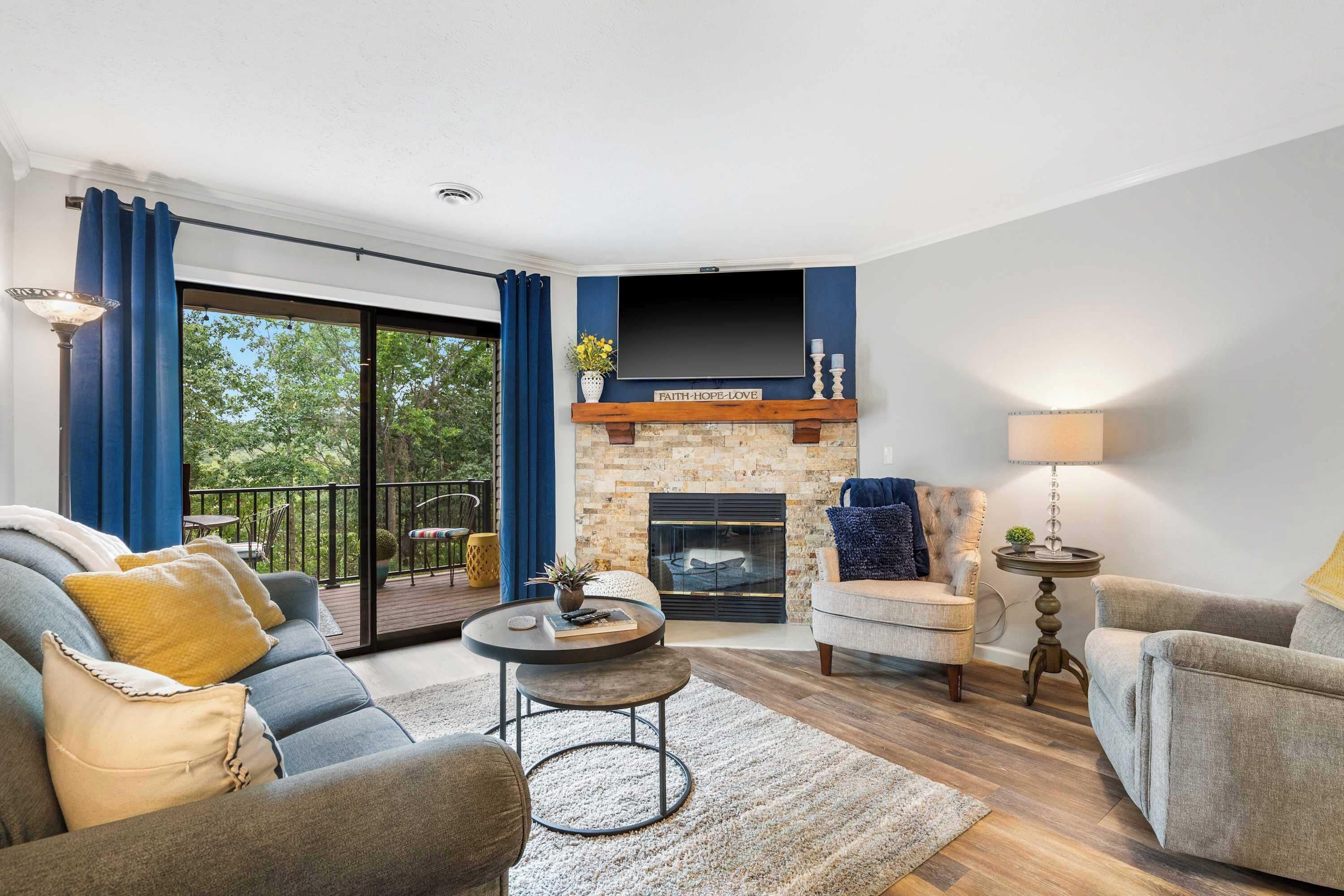 Condo, Multiple Beds, Balcony, Garden View (Blue Royale Retreat) | Living area | 42-inch flat-screen TV with digital channels, fireplace