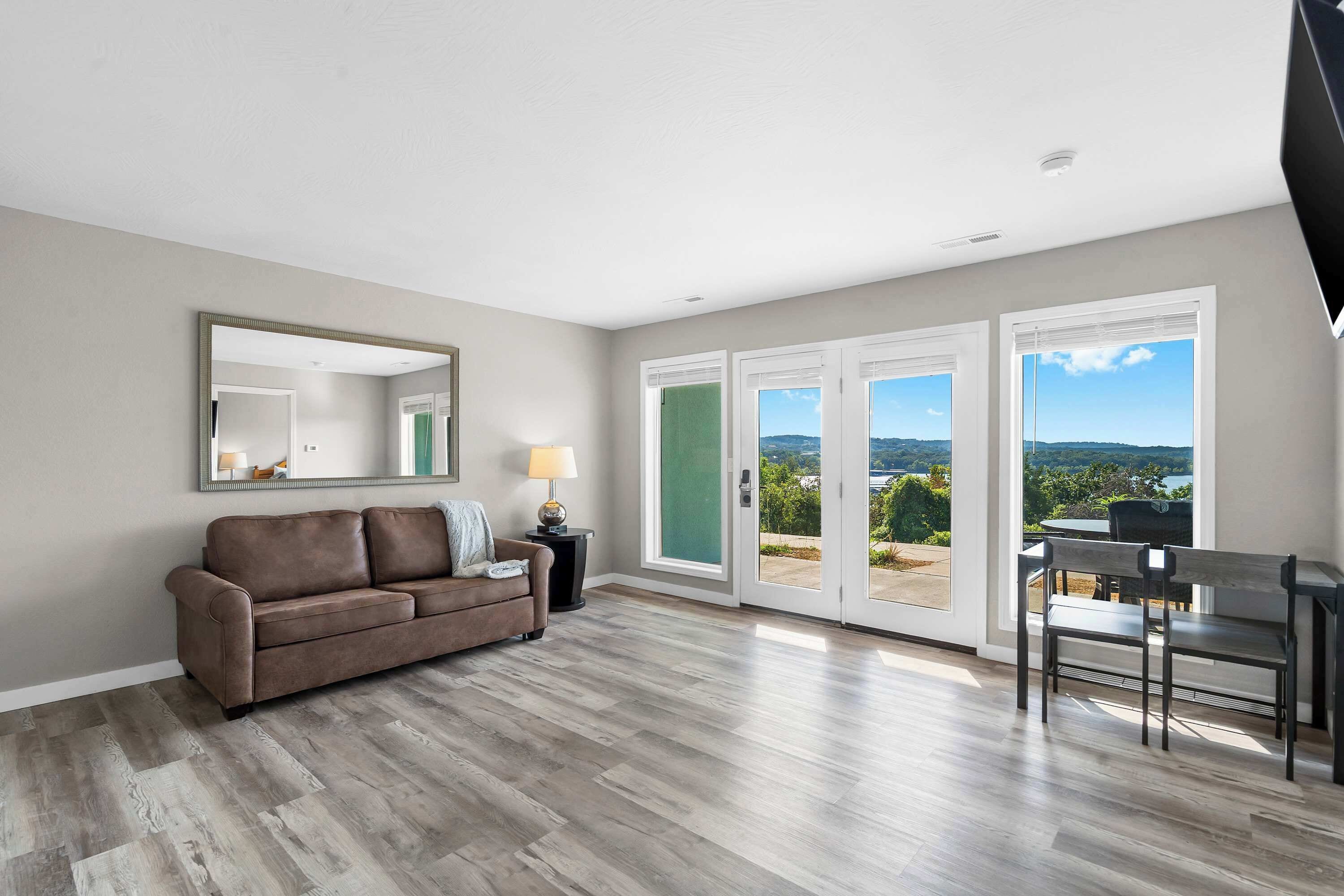 Appart'hôtel, 1 très grand lit et 1 canapé-lit, patio (Waterview Oasis) | Coin séjour