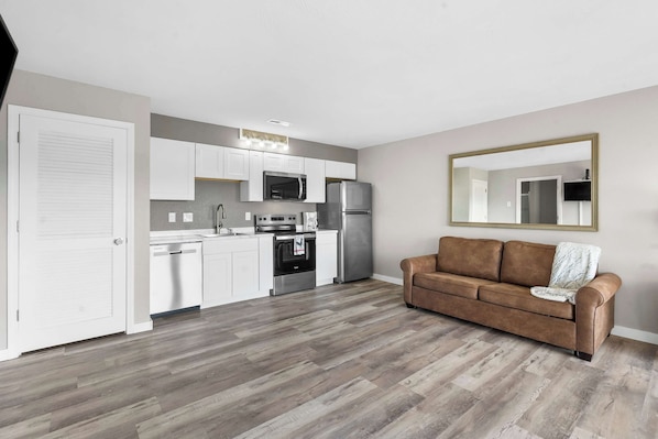Condo, 1 King Bed with Sofa bed, Patio (Waterview Oasis) | Living area | 40-inch flat-screen TV with digital channels