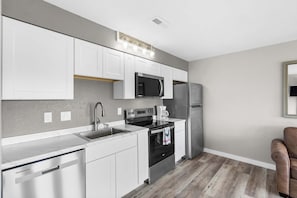 Condo, 1 King Bed with Sofa bed, Patio (Waterview Oasis) | Private kitchen | Fridge, microwave, oven, stovetop