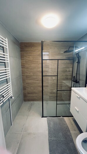 Shower, hair dryer, towels, soap