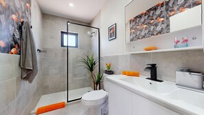 Shower, hair dryer, towels, soap