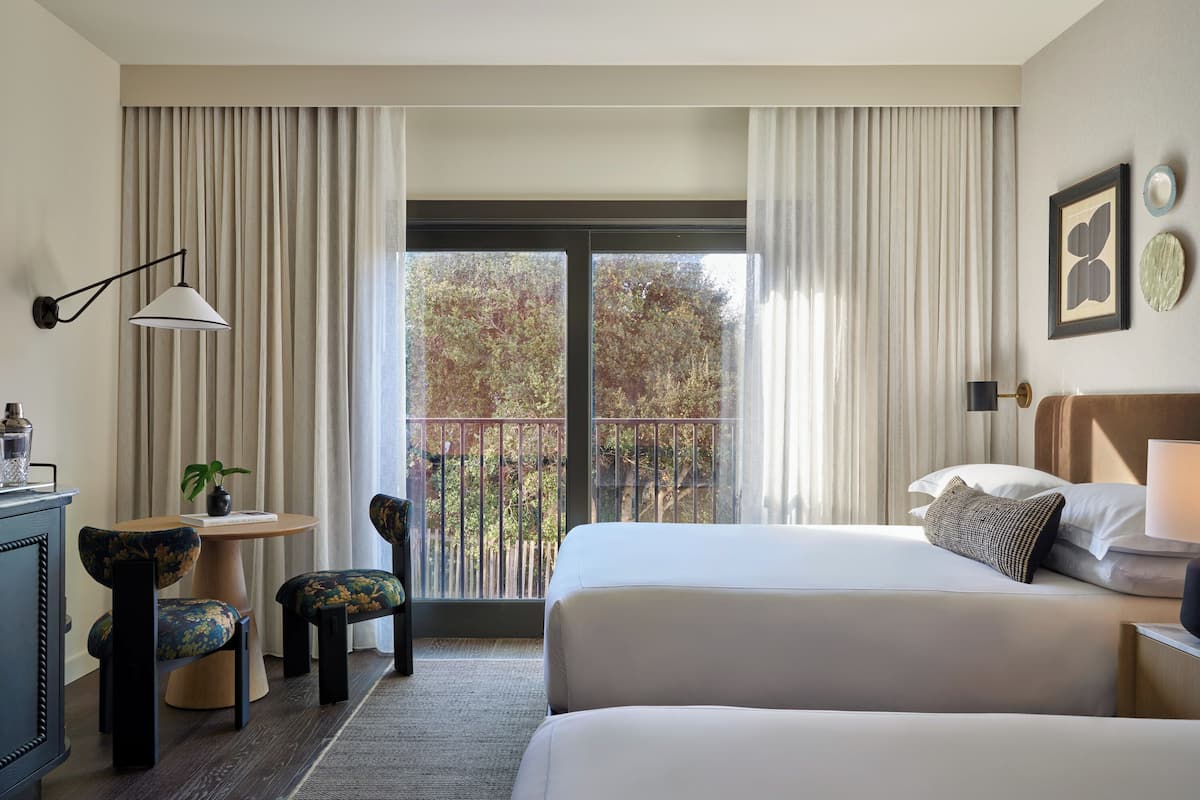 Premium bedding, pillowtop beds, minibar, in-room safe