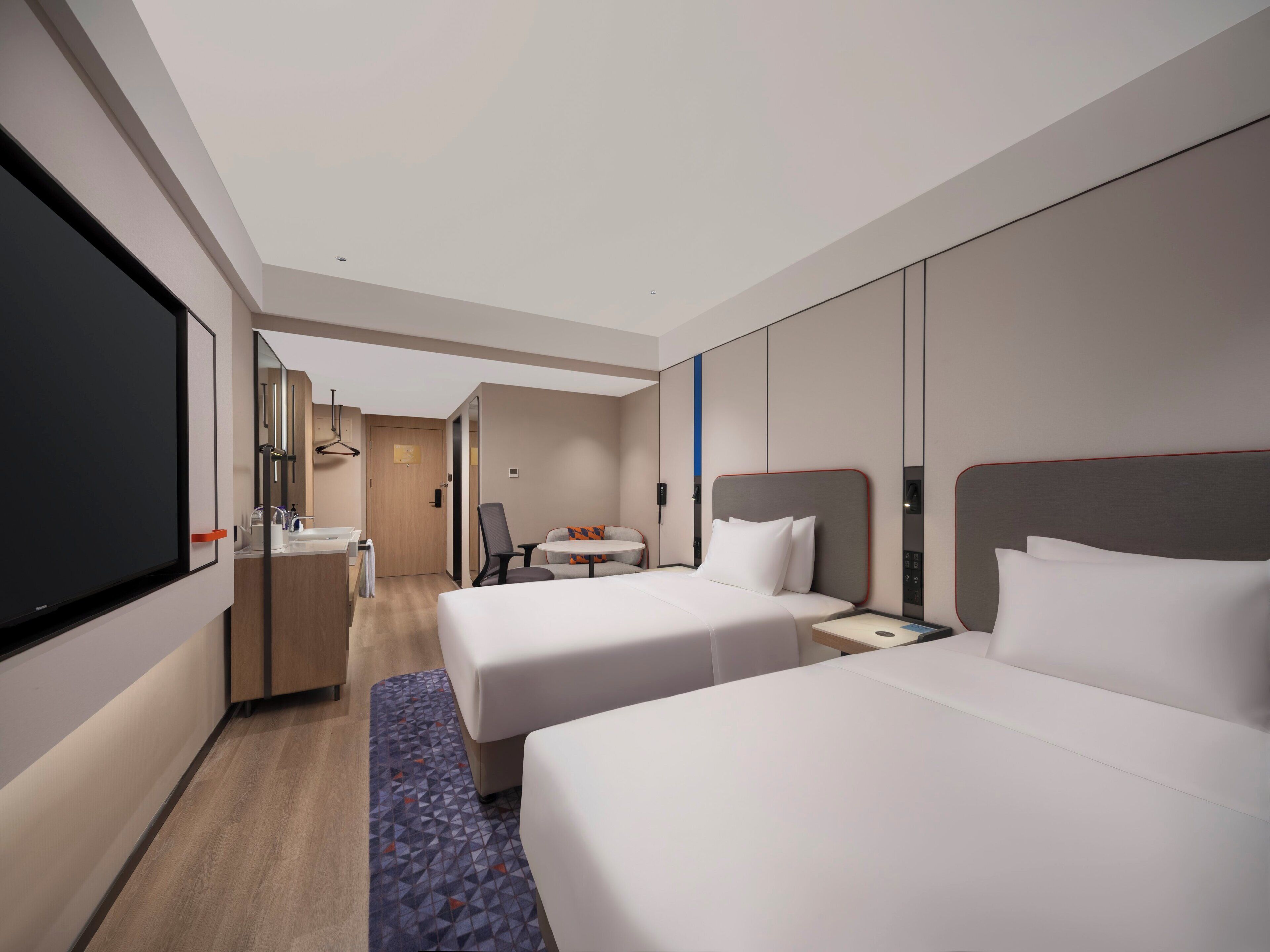 Premium bedding, down duvets, desk, laptop workspace