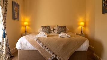 4 habitaciones, tabla de planchar con plancha y cuna de viaje