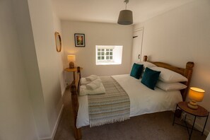 2 habitaciones, tabla de planchar con plancha y cuna de viaje 