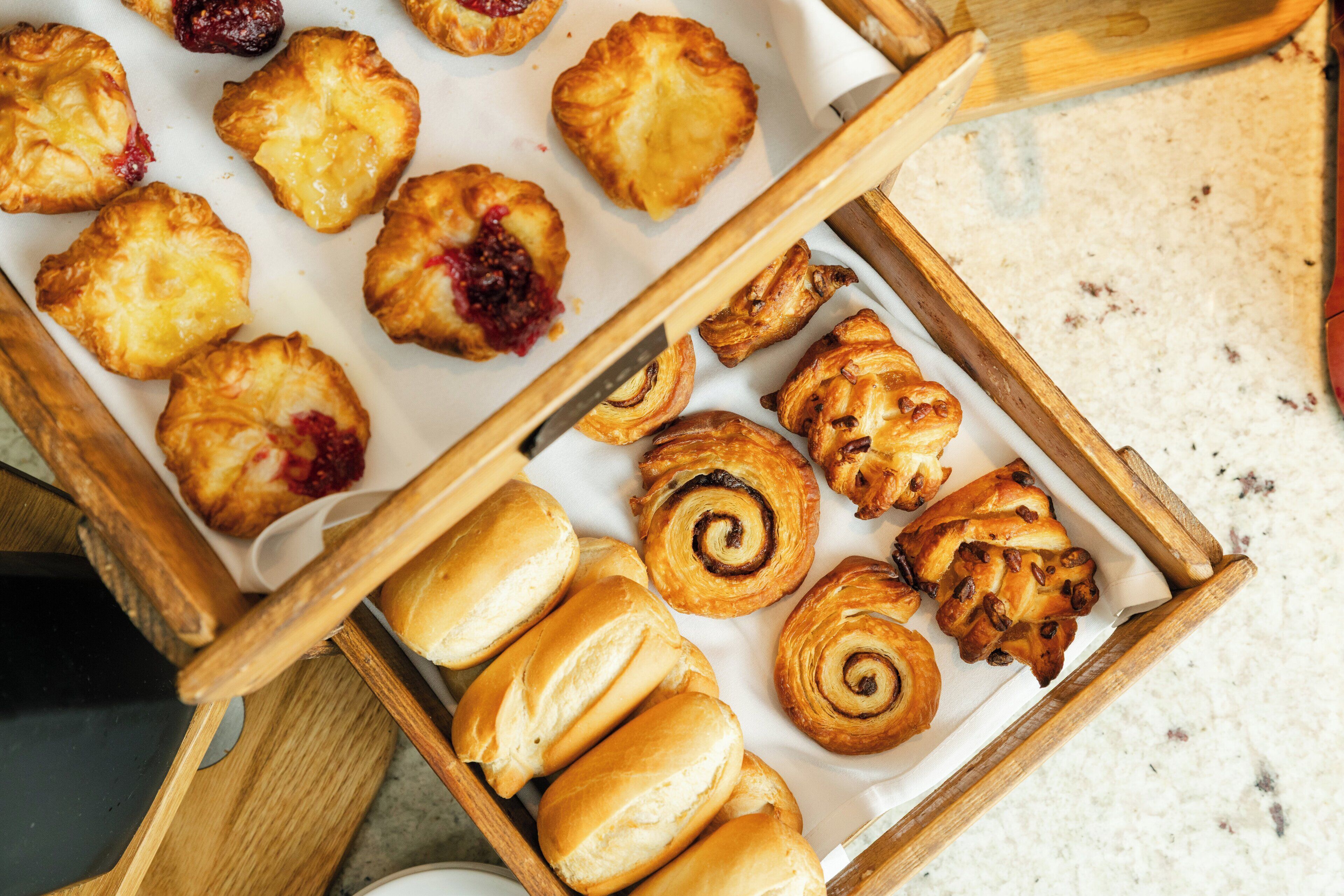 A variety of pastries on a tray.