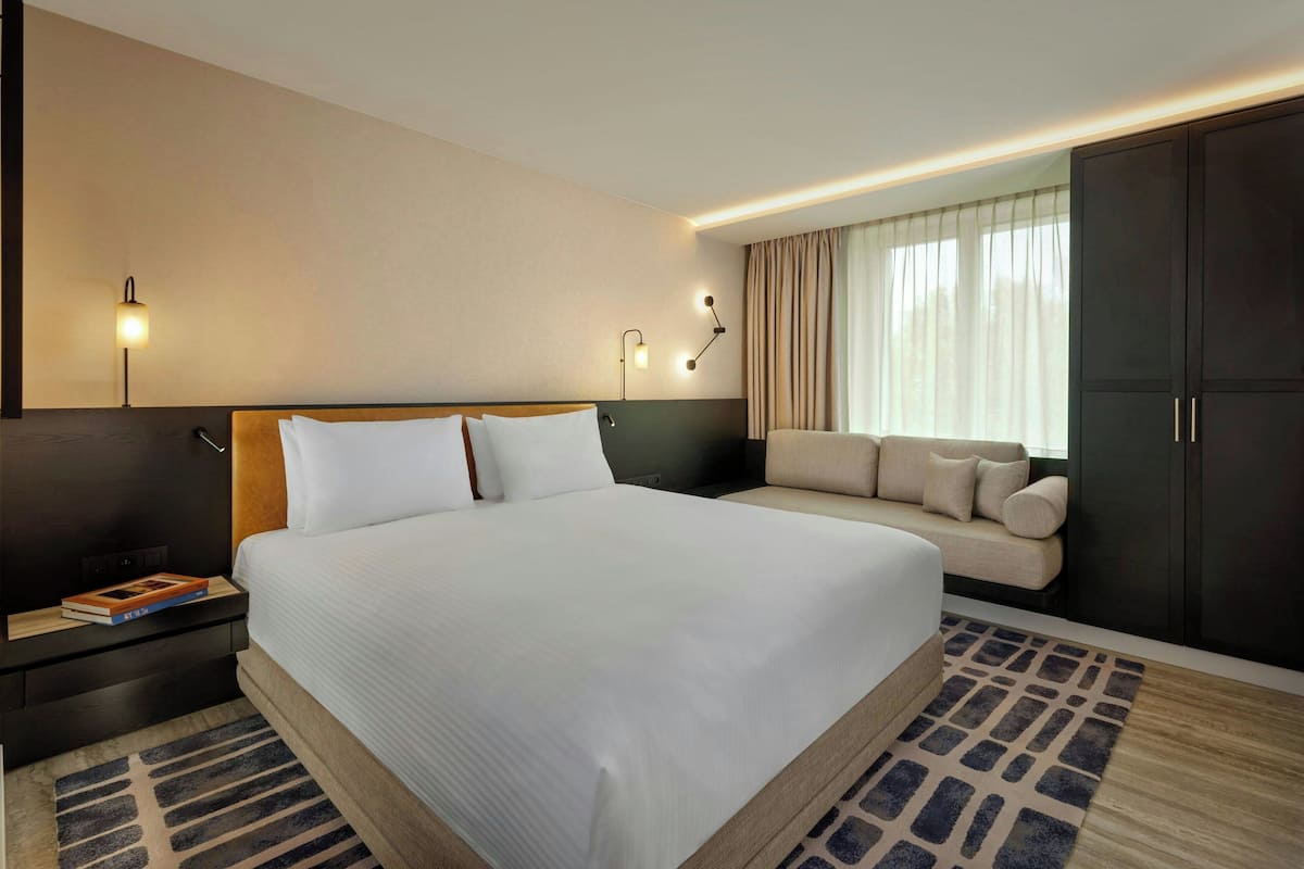 Premium bedding, in-room safe, desk, soundproofing