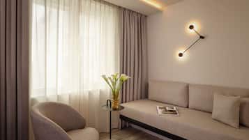 Junior Room, 1 King Bed | Living area | 140-cm LCD TV with cable channels