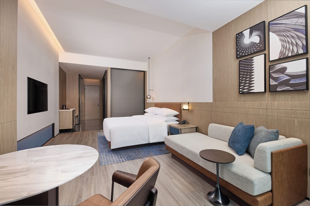 Premium Room, 1 King Bed, City View | In-room safe, laptop workspace, blackout drapes, iron/ironing board