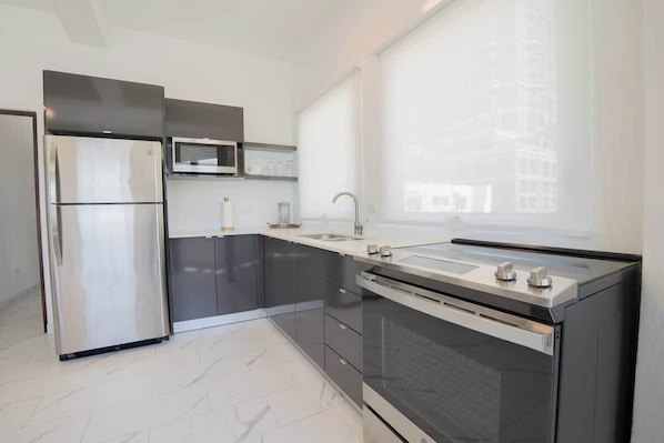Microwave, oven, stovetop, dining table