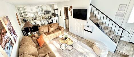 Smart TV, fireplace, books