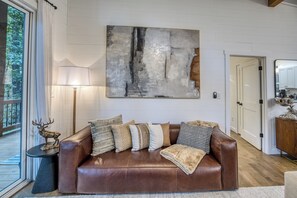 Smart TV, fireplace, table football, books