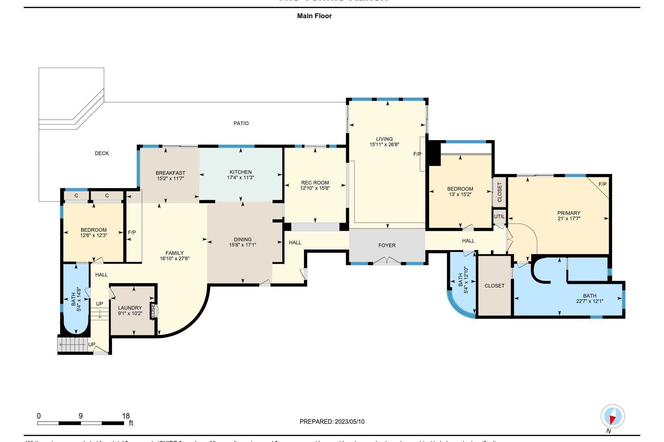 A floor plan of a residential property with a main floor layout, including a living room, kitchen, dining area, bedrooms, bathroom, and a patio.