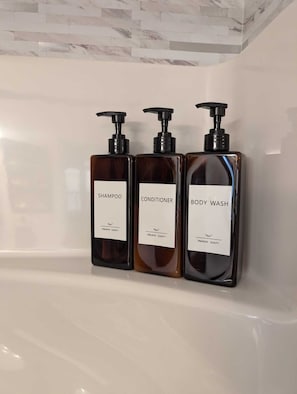 Hair dryer, towels, soap, shampoo