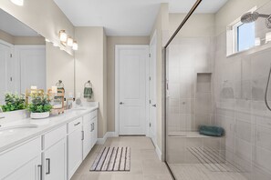 Shower, hair dryer, towels