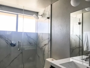 Shower, hair dryer, towels, soap