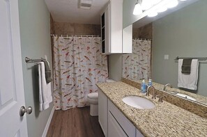 Jetted bath, hair dryer, towels, soap